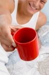 Man Showing Coffee Mug Stock Photo