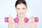 Woman With Two Weights Stock Photo