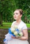 Portrait Of A Bride With A Bouquet Of Flowers Stock Photo