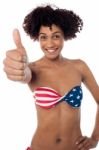 Stars And Stripes Bikini Model Showing Thumbs Up Stock Photo