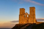 Remains Of Reculver Church Towers Bathed In Late Afternoon Sun I Stock Photo