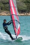 Windsurfing At Porto Pollo In Sardinia Stock Photo