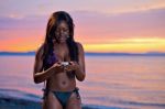 Beautiful Black African American Woman Posing On The Beach At Su Stock Photo