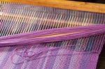 Detail Of Fabric In Comb Loom With Ultraviolet And Lilac Colors Stock Photo