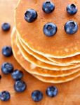 Stack Of Pancakes With Fresh Blueberries Stock Photo