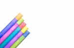 Row Of Rainbow Colored Chalk Isolate On White Background Stock Photo