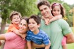 Kids Enjoying Piggyback Ride Stock Photo