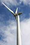 Wind Turbine In Cloudy Stock Photo