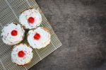 Deliciou Cupcake On The Wooden Floor Stock Photo