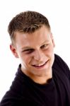 Smiling Young Man looking up Stock Photo