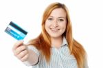 Young Lady Showing Her Cash Card Stock Photo