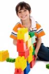 Young Boy Playing With Building Blocks Stock Photo