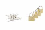 Golden Closed Padlocks With Keys On White Stock Photo