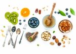 Ingredients For A Healthy Foods Background, Nuts, Honey, Berries Stock Photo