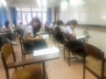 Blur Background University Students Writing Answer Doing Exam In Stock Photo