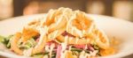 Deep Fried Calamari Rings And Salad Stock Photo