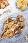 Grilled European Seabass With Potato And Tomato Salad Stock Photo