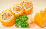 Smoked Salmon Sushi Roll On Plate Stock Photo