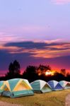 Tourist Tent With Beautiful Sunset Background Stock Photo