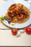 Italian Seafood Spaghetti Pasta On Red Tomato Sauce Stock Photo