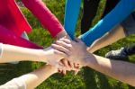 Group Of Friends Pile Up Hands As Unity Oath Stock Photo