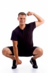 Man doing sitting exercise Stock Photo