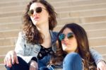 Young Beautiful Girls With Denim Suit In A Urban Background Stock Photo