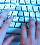 Typist At Work On Computer Stock Photo