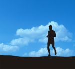 A Lone Runner On The Horizon Stock Photo