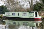 Narrow Boat On The River Wey Navigations Canal Stock Photo