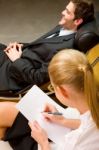 Psychiatrist Examining A Male Patient Stock Photo