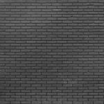 Black Brick Wall Background Stock Photo