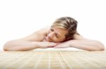 Matured Woman Lying On Mat Stock Photo