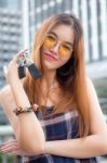 Portrait Of Thai Chinese Adult Beautiful Girl Denim Blue Bag And Key Stock Photo