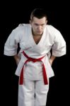 Contrast Karate Young Fighter On Black Stock Photo