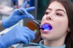 Young Woman At The Dental Office Stock Photo