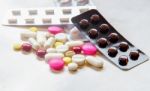 Top View Of The Pills On The White Background, Pack Of Tablet Drug And Capsule Pills On The Floor Stock Photo