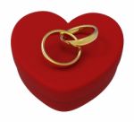 Wedding Rings On Heart Box Show Engagement And Marriage Stock Photo