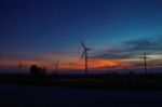 Wind Turbines With Silhouettes Stock Photo