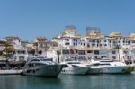 View Of Luxury Yachts In The Harbour At Porto Banus Stock Photo