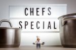 Cheerful Miniature Chef. Chef's Special Concept Stock Photo