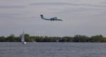 Beautiful Landing Of The Plane Near The Lake Stock Photo