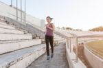 Women Runners Sprinting Outdoors. Healthy Lifestyle And Sport Co Stock Photo