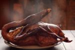 Roast Duck On Table Stock Photo