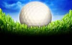 Golf Ball In Green Grass Stock Photo