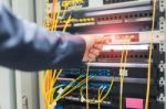 People Fix Node Fiber Optic In Network Room Stock Photo