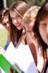 Group Of Students Reading Books Stock Photo