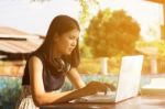 Asian Woman Or Student Using Laptop  Stock Photo