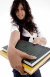 Young Female Showing Her Books Stock Photo