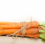 Baby Carrots Bunch Tied With Rope Stock Photo